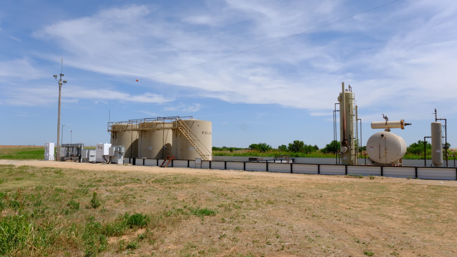 Tank battery and separation equipment where associated gas is captured on a Kansas lease